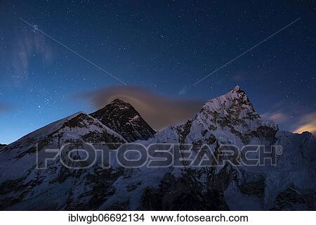 Picture - View at night from Kala Patthar to Mount Everest, Chomolungma, Sagarmatha, 8848m, and Nuptse west flank, 7861m, Sagarmatha National Park, Solu Khumbu, Nepal, Asia. Fotosearch