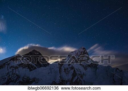 Stock Photograph - View at night from Kala Patthar to Mount Everest, Chomolungma, Sagarmatha, 8848m, and Nuptse west flank, 7861m, Sagarmatha National Park, Solu Khumbu, Nepal, Asia. Fotosearch