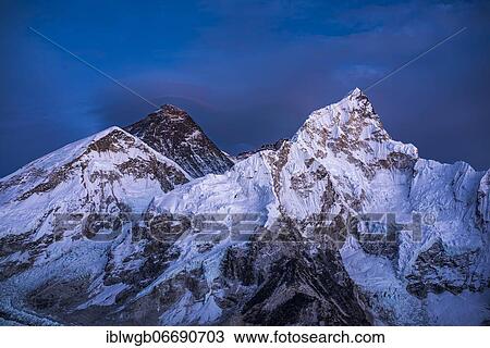 Stock Image - View from Kala Patthar in the evening light on Mount Everest, 8848 m, Chomolungma, Sagarmatha, and Nuptse west flank with Khumbu glacier, Sagarmatha National Park, Khumbu Himal, Himalaya, Nepal, Asia. Fotosearch