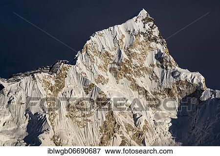 View from Kala Patthar in the evening light on Nuptse west flank, 7861 m, Sagarmatha National Park, Khumbu Himal, Himalaya, Nepal, Asia View Large Photo Image Stock Photo - View from Kala Patthar in the evening light on Nuptse west flank, 7861 m, Sagarmatha National Park, Khumbu Himal, Himalaya, Nepal, Asia. Fotosearch