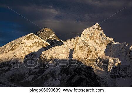 Stock Photo - View from Kala Patthar in the evening light on Mount Everest, 8848 m, Chomolungma, Sagarmatha, and Nuptse west flank with Khumbu glacier, Sagarmatha National Park, Khumbu Himal, Himalaya, Nepal, Asia. Fotosearch