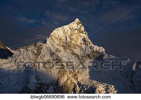 Stock Photograph - View from Kala Patthar in the evening light on Nuptse west flank, 7861 m, Sagarmatha National Park, Khumbu Himal, Himalaya, Nepal, Asia. Fotosearch