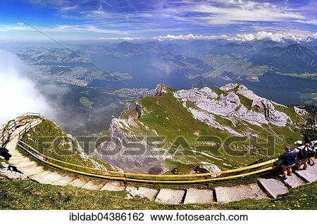 View from Pilatus mountain to Lake Lucerne and Central Swiss Alps, boundary region Nidwalden Obwalden and Lucerne, Switzerland, Europe View Large Photo Image Stock Image - View from Pilatus mountain to Lake Lucerne and Central Swiss Alps, boundary region Nidwalden Obwalden and Lucerne, Switzerland, Europe. Fotosearch