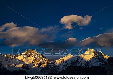Stock Image - View in the evening light from Renjo La Pass 5417 m to the east on Himalaya with Gyachung Kang, 7952 m, and Hungchi, 7036 m, Khumbu Himal, Himalaya, Nepal, Asia. Fotosearch