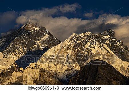 Stock Photo - View in the evening light from Renjo La Pass 5417 m, east to Himalaya with Mount Everest, 8848 m, Nuptse, 7879 m and Lhotse, 8516 m, Khumbu Himal, Himalaya, Nepal, Asia. Fotosearch