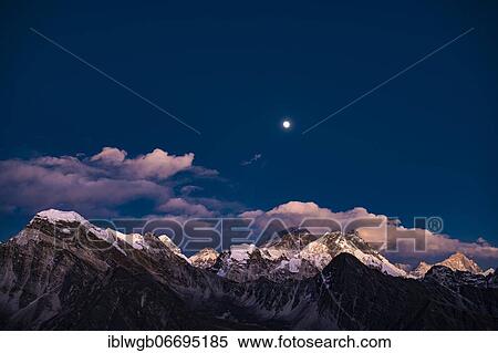 Stock Photography - View in the moonlight from Renjo La Pass 5417 m to the east on Himalaya with Mount Everest, 8848 m, Nuptse, 7879 m and Lhotse, 8516 m, Khumbu Himal, Himalaya, Nepal, Asia. Fotosearch