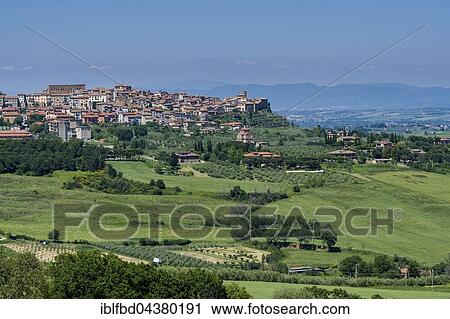 View of a town, surrounded by farms and fields, Chianchiano Therme, Tuscany, Italy, Europe View Large Photo Image Stock Image - View of a town, surrounded by farms and fields, Chianchiano Therme, Tuscany, Italy, Europe. Fotosearch