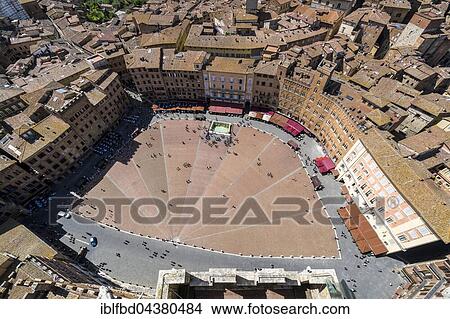 View of Piazza del Campo and city roofs from Torre del Mangia, Siena, Tuscany, Italy, Europe View Large Photo Image Picture - View of Piazza del Campo and city roofs from Torre del Mangia, Siena, Tuscany, Italy, Europe. Fotosearch