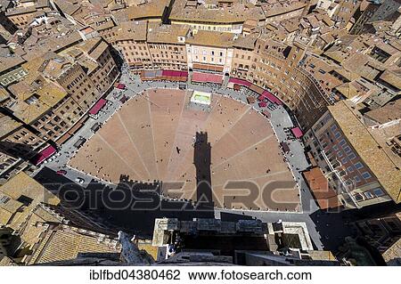 View of Piazza del Campo and city roofs from Torre del Mangia, Siena, Tuscany, Italy, Europe View Large Photo Image Stock Image - View of Piazza del Campo and city roofs from Torre del Mangia, Siena, Tuscany, Italy, Europe. Fotosearch