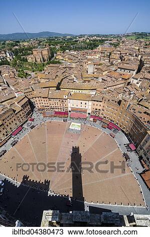 View of Piazza del Campo and city roofs from Torre del Mangia, Siena, Tuscany, Italy, Europe View Large Photo Image Stock Image - View of Piazza del Campo and city roofs from Torre del Mangia, Siena, Tuscany, Italy, Europe. Fotosearch