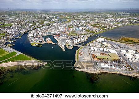 View of town and harbour, docks and Business Enterprise Park, Galway, County Clare, Ireland, Europe View Large Photo Image Stock Photo - View of town and harbour, docks and Business Enterprise Park, Galway, County Clare, Ireland, Europe. Fotosearch