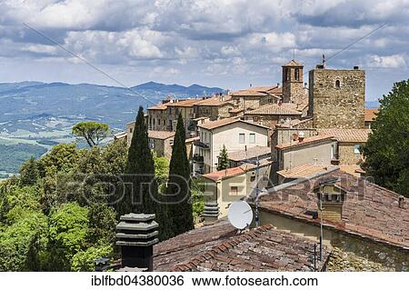 Stock Photograph - View over houses towards valley, Sassa, Tuscany, Italy, Europe. Fotosearch