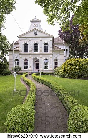 Villa Thoben in Ramsloh, Saterland, Oldenburger Münsterland, Lower Saxony, Germany, Europe View Large Photo Image Stock Image - Villa Thoben in Ramsloh, Saterland, Oldenburger Münsterland, Lower Saxony, Germany, Europe. Fotosearch