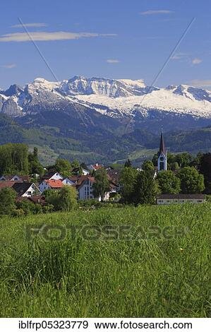 Village Bubikon, in front of the Glaernisch, Glarner Alps, Zuercher Oberland, Switzerland, Glärnisch, Europe View Large Photo Image Stock Photo - Village Bubikon, in front of the Glaernisch, Glarner Alps, Zuercher Oberland, Switzerland, Glärnisch, Europe. Fotosearch