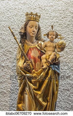 Virgin Mary figure with baby Jesus, Church St, Johann Baptist, Ismaning, Upper Bavaria, Bavaria, Germany, Europe View Large Photo Image Stock Image - Virgin Mary figure with baby Jesus, Church St, Johann Baptist, Ismaning, Upper Bavaria, Bavaria, Germany, Europe. Fotosearch