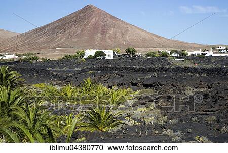 Volcanic cone and lava flows village of Tahiche, Lanzarote, Canary Islands, Spain, Europe View Large Photo Image Stock Image - Volcanic cone and lava flows village of Tahiche, Lanzarote, Canary Islands, Spain, Europe. Fotosearch
