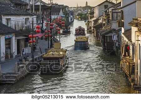 Stock Photography - Waterway, canal with tourist boats, Suzhou, China, Asia. Fotosearch