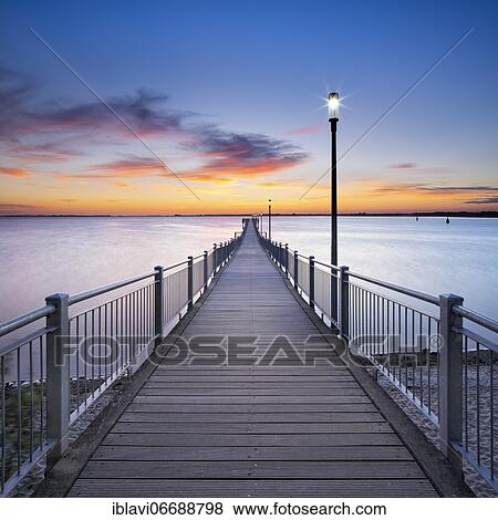 Stock Photo - Wendorf pier at dawn, Hanseatic city of Wismar, Mecklenburg-Western Pomerania, Germany, Europe. Fotosearch