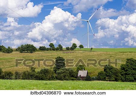 Wind power plant and a little house in agricultural landscape, Hermsdorf, Saxony, Germany, Europe View Large Photo Image Stock Image - Wind power plant and a little house in agricultural landscape, Hermsdorf, Saxony, Germany, Europe. Fotosearch