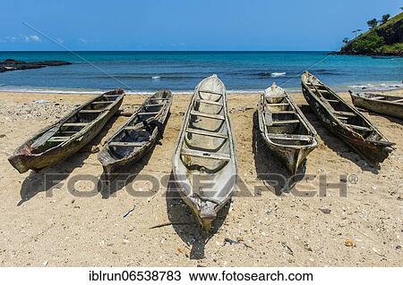 Wooden fishing boats in the fishing village Morro Peixe in northern Sao Tome, Sao Tome and Principe, Atlantic ocean, Africa View Large Photo Image Stock Image - Wooden fishing boats in the fishing village Morro Peixe in northern Sao Tome, Sao Tome and Principe, Atlantic ocean, Africa. Fotosearch