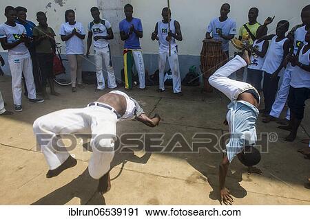 Stock Image - Young boys performing Capoeira in the city of Sao Tome, Sao Tome and Principe, Atlantic ocean, Africa. Fotosearch