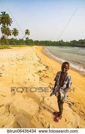 Picture - Young boys posing on a beach, Buchanan, Liberia, Africa. Fotosearch
