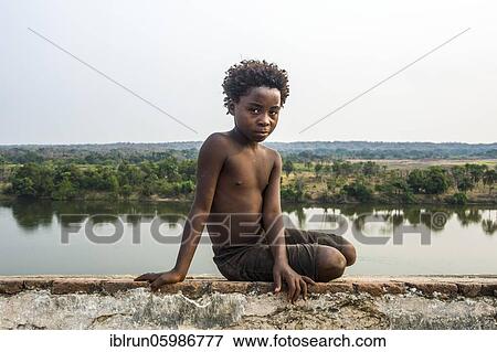 Young kids posing for the camera, Massangano, Cuanza Norte, Angola, Africa View Large Photo Image Stock Photo - Young kids posing for the camera, Massangano, Cuanza Norte, Angola, Africa. Fotosearch