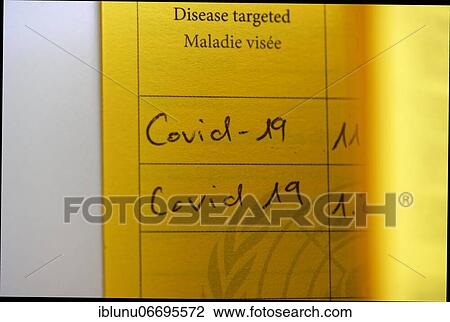 Stock Image - 2 Covid vaccinations with vaccine Comirnaty registered in a vaccination card, COVID-19 mRNA vaccine, Bern, Switzerland, Europe. Fotosearch