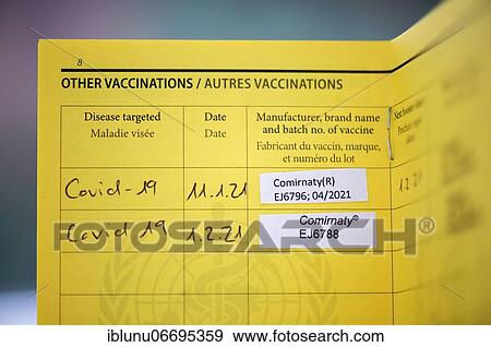 Stock Photo - 2 Covid vaccinations with vaccine Comirnaty registered in a vaccination card, COVID-19 mRNA vaccine, Bern, Switzerland, Europe. Fotosearch