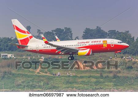 Stock Photo - A Boeing 737-700 aircraft of Lucky Air with registration number B-5806 at Chengdu Airport (CTU), Chengdu, China, Asia. Fotosearch