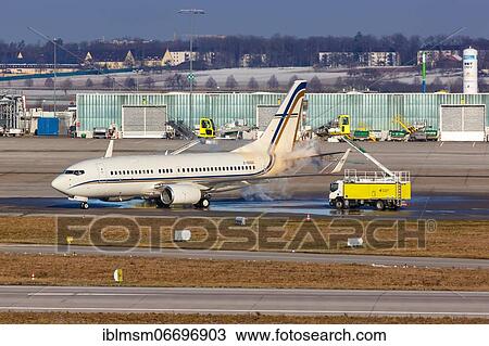 A Boeing 737-700 (BBJ) of Gainjet Ireland with registration number 2-SGSG during de-icing de-icing at Stuttgart Airport (STR), Stuttgart, Germany, Europe View Large Photo Image Stock Image - A Boeing 737-700 (BBJ) of Gainjet Ireland with registration number 2-SGSG during de-icing de-icing at Stuttgart Airport (STR), Stuttgart, Germany, Europe. Fotosearch