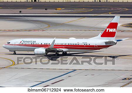 A Boeing 737-800 aircraft of American Airlines with the registration N915NN in the TWA special livery at Phoenix Airport, USA, North America View Large Photo Image Picture - A Boeing 737-800 aircraft of American Airlines with the registration N915NN in the TWA special livery at Phoenix Airport, USA, North America. Fotosearch