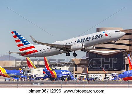 Stock Photograph - A Boeing 737-800 aircraft of American Airlines with the registration N944AN at Phoenix Airport, USA, North America. Fotosearch