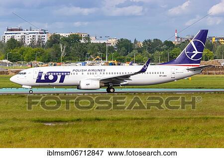 A Boeing 737-800 aircraft of LOT Polskie Linie Lotnicze with registration SP-LWD at Warsaw Airport, Poland, Europe View Large Photo Image Stock Photo - A Boeing 737-800 aircraft of LOT Polskie Linie Lotnicze with registration SP-LWD at Warsaw Airport, Poland, Europe. Fotosearch