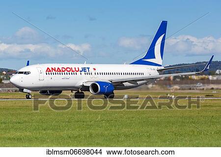 A Boeing 737-800 of AnadoluJet with the registration TC-JKU at Stuttgart Airport, Germany, Europe View Large Photo Image Picture - A Boeing 737-800 of AnadoluJet with the registration TC-JKU at Stuttgart Airport, Germany, Europe. Fotosearch