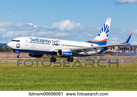 Stock Image - A Boeing 737-800 of SunExpress with the registration TC-SEJ at Stuttgart Airport, Germany, Europe. Fotosearch
