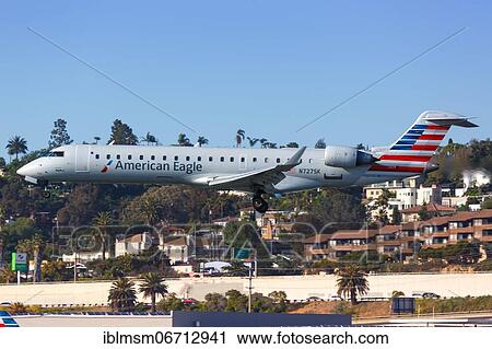 A Bombardier CRJ-700 aircraft of American Eagle with registration N727SK lands at San Diego airport, USA, North America View Large Photo Image Stock Image - A Bombardier CRJ-700 aircraft of American Eagle with registration N727SK lands at San Diego airport, USA, North America. Fotosearch