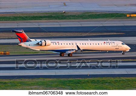 A Bombardier CRJ-900 aircraft of Delta Connection Endeavor Air with registration N304PQ at Atlanta Airport, USA, North America View Large Photo Image Stock Photo - A Bombardier CRJ-900 aircraft of Delta Connection Endeavor Air with registration N304PQ at Atlanta Airport, USA, North America. Fotosearch