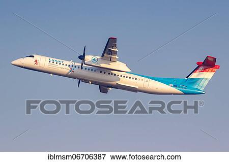 Stock Photo - A Bombardier DHC-8-400 of Luxair with registration LX-LGN at Malpensa Airport in Milan, Italy, Europe. Fotosearch