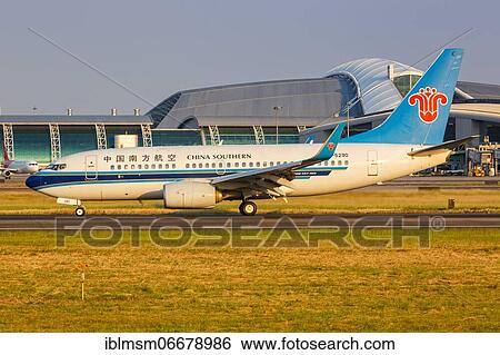 Stock Photograph - A China Southern Airlines Boeing 737-700 aircraft with registration number B-5290 at Guangzhou Airport, China, Asia. Fotosearch