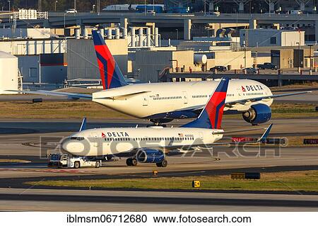 A Delta Air Lines Boeing 737-700 aircraft with registration number N303DQ at Atlanta Airport, USA, North America View Large Photo Image Stock Image - A Delta Air Lines Boeing 737-700 aircraft with registration number N303DQ at Atlanta Airport, USA, North America. Fotosearch