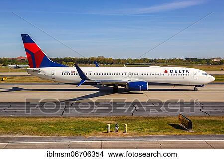 Picture - A Delta Air Lines Boeing 737-900ER aircraft with registration number N912DU takes off from Atlanta Airport, U. S. Fotosearch