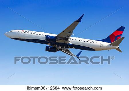 Picture - A Delta Air Lines Boeing 737-900ER aircraft with registration N842DN takes off from Atlanta Airport, U. S. Fotosearch