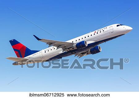 Stock Photography - A Delta Connection Embraer ERJ 175 aircraft with registration N604CZ takes off from Phoenix Airport, USA, North America. Fotosearch