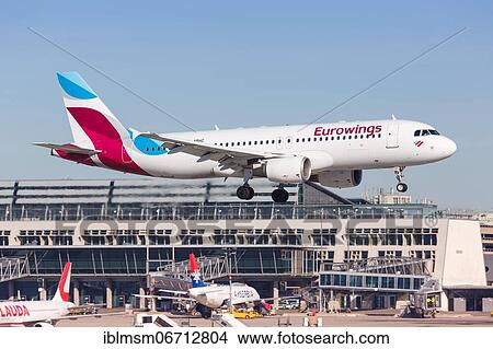 A Eurowings Airbus A320 with registration D-ABHC lands at Stuttgart Airport, Germany, Europe View Large Photo Image Picture - A Eurowings Airbus A320 with registration D-ABHC lands at Stuttgart Airport, Germany, Europe. Fotosearch