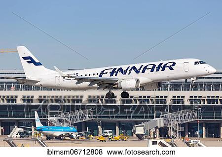 Stock Photo - A Finnair Embraer ERJ190 with registration OH-LKG lands at Stuttgart Airport, Germany, Europe. Fotosearch