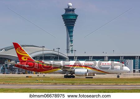 Stock Photography - A Hainan Airlines Boeing 787-8 Dreamliner aircraft with registration number B-2739 at Guangzhou Airport, China, Asia. Fotosearch