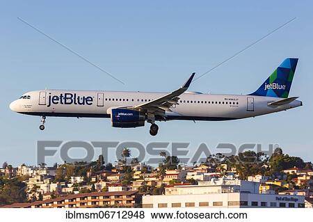 A JetBlue Airbus A321 aircraft with registration number N962JT lands at San Diego airport, U. S View Large Photo Image Stock Photo - A JetBlue Airbus A321 aircraft with registration number N962JT lands at San Diego airport, U. S. Fotosearch