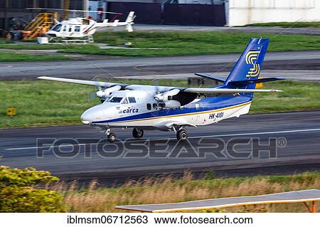A Let L-410 aircraft of Searca with registration HK-4161 lands at Medellin airport, Colombia, South America View Large Photo Image Stock Image - A Let L-410 aircraft of Searca with registration HK-4161 lands at Medellin airport, Colombia, South America. Fotosearch