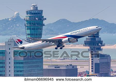 Stock Photography - A Malaysia Airlines Airbus A330-300 aircraft with registration number 9M-MTB at Hong Kong Airport (HKG), Hong Kong, China, Asia. Fotosearch